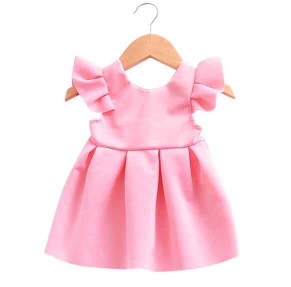 the backside of pink Flower bow long sleeve dress