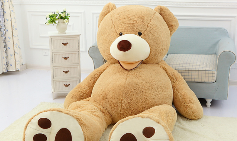 a life size giant beige plush soft teddy bear