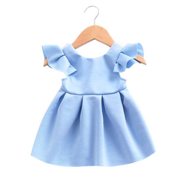 backside of blue Flower bow long sleeve dress
