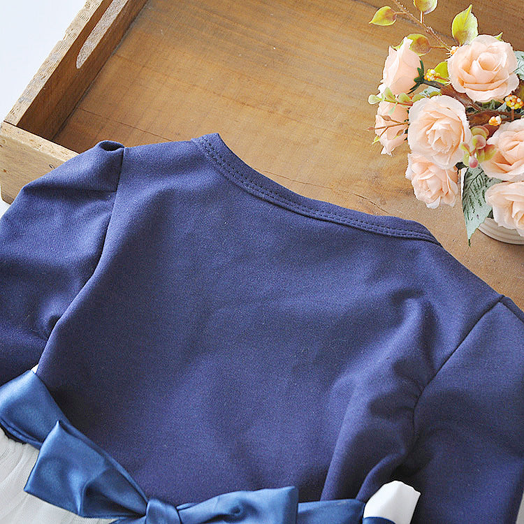 the back side of blue dress