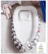 a white portable crib travel bed for infant children