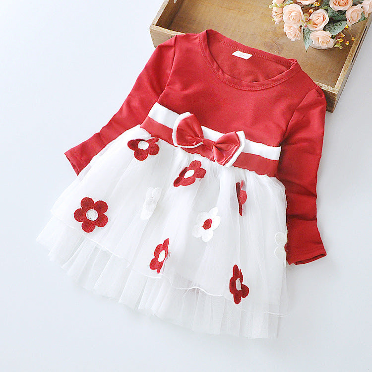 red colored long sleeve dress with flower bow