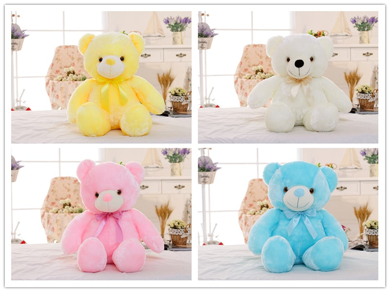 four LED light teddy bears yellow, white, pink and blue are on display